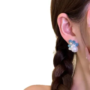 Elegant Korean style silver needle stud earrings featuring blue beads and a white pearl