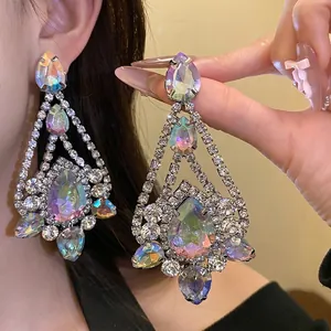 Elegant teardrop dangle earrings with iridescent crystals and shimmering rhinestones.
