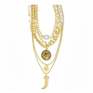 Vintage multi-layered gold necklace with crystal coin and horn pendants