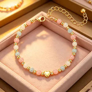 Bracelet perles élégant avec quartz rose, aigue-marine et un pendentif cœur doré