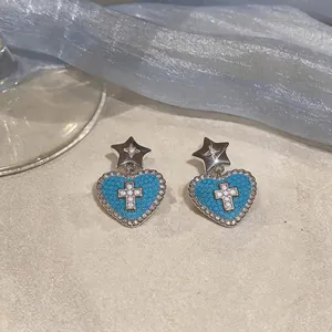 Eleganti orecchini pendenti a stella e cuore in argento con pietre blu e croce