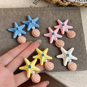 Fresh starfish hair clips with blue rhinestones and pearls for beach vacation