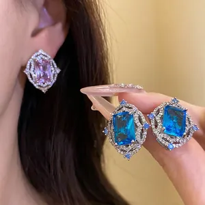 Elegant vintage palace style square blue zircon ring with sparkling diamond border for women