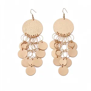 Stylish gold metallic round sequin tassel drop earrings with a bold, bohemian aesthetic