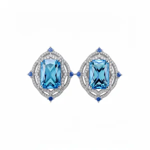 Vintage luxury jewelry with rectangular blue zircon in a pave silver halo frame
