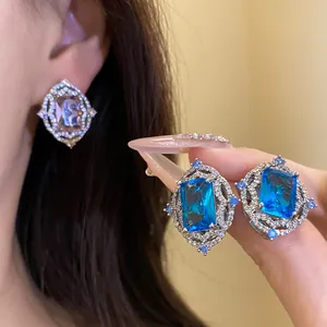 Detailed view of luxury vintage court style emerald-cut blue zircon jewelry set