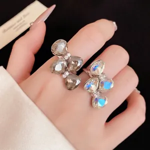 Elegant silver-tone crystal bow open rings with sparkling faceted stones and micro-pave diamonds