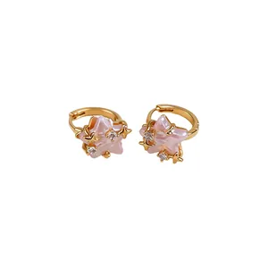 Elegant pink star hoop earrings with shimmering pearlescent center and zircon accents