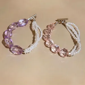 Elegante bracciale a più fili di perle e cristalli sfaccettati con chiusura a T