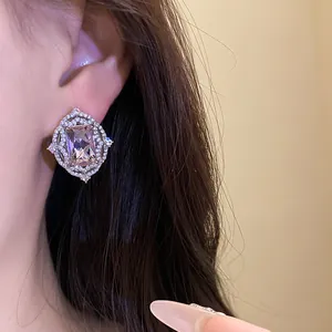 Elegant vintage court style silver earring with large purple square zircon stone