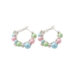 Elegant silver-needle hoop earrings featuring colorful pearls and sparkling rhinestone accents