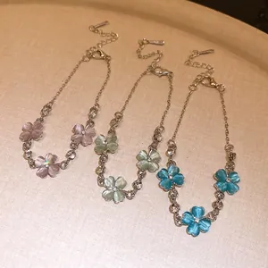 Eleganti braccialetti di fiori in pietra occhio di gatto con strass scintillanti in tre colori