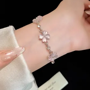 Bracciale dolce con fiori in pietra occhio di gatto e strass per donne.
