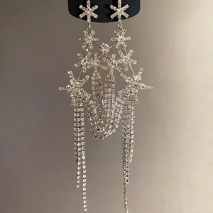 Elegant silver-tone snowflake drop earrings with long rhinestone tassels for women