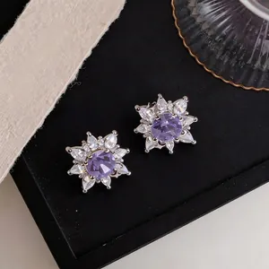 Elegant sparkling purple zircon flower stud earrings with white marquise crystals