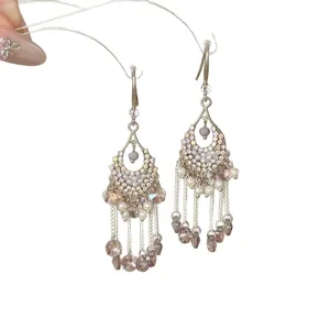 Vintage ethnic style teardrop tassel earrings with sparkling crystals and elegant pearls