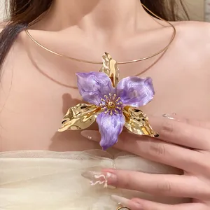 Close-up detail of a vintage style purple enamel flower choker necklace worn by a model