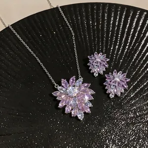 Exquisite purple zircon flower necklace and stud earring set on a black background