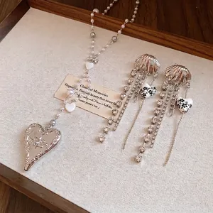 Elegant pearl beaded heart necklace and long tassel earring jewelry set