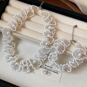 Elegant handmade white glass beaded lace necklace and bracelet jewelry set with pearls