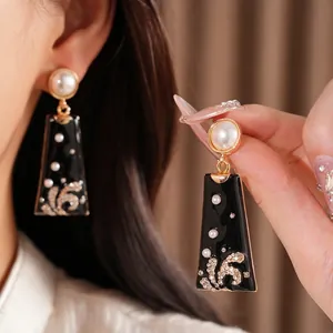 Vintage black enamel earrings with pearls and rhinestones for elegant look