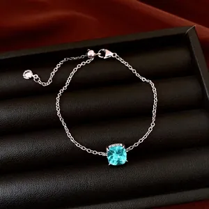 Elegant silver bracelet with square blue zircon pendant in luxury gift box
