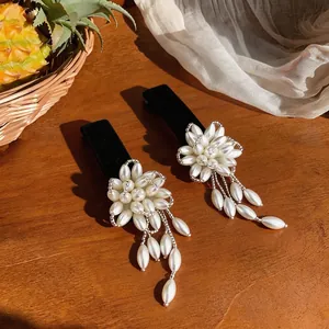 Elegant French style floral pearl hair clips with velvet base and dangling tassels