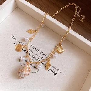 Collana di perle e conchiglie in stile vintage con ciondolo in conchiglia