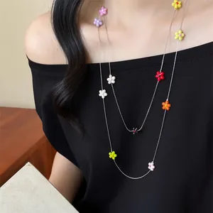 Stylish double-layer necklace with colorful resin flower charms for a chic summer vacation look