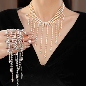 Close-up view of an elegant silver rhinestone necklace featuring waterdrop tassels