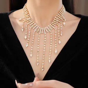 Elegant close-up of a luxury palace style rhinestone necklace with teardrop tassel design