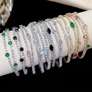 Luxury 18k gold plated tennis bracelets featuring colorful zircon stones on a white display