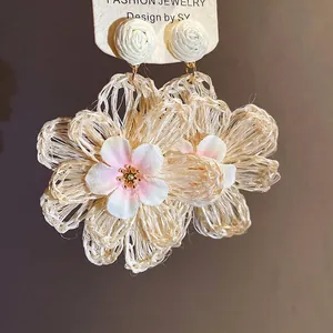 Bohemian handmade raffia woven flower drop earrings with pink center for resort style