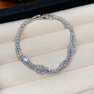 Detailed view of 18k silver plated double-strand bracelet with marquise-cut cubic zirconia