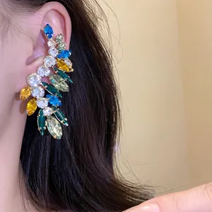 Elegant silver needle ear cuff featuring vibrant colorful marquise-cut crystals design