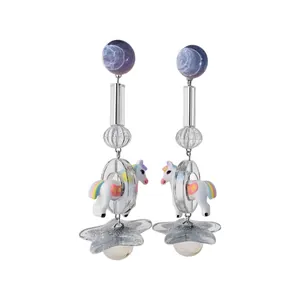 Elegant carousel horse and star shaped dangle earrings with silver needle studs for women