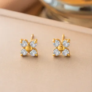 Elegant gold titanium steel flower stud earrings with sparkling round clear crystals