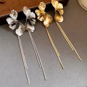 Elegant floral tassel drop earrings with silver needles in gold and silver finishes