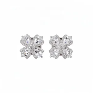 Elegant silver flower clip-on earrings featuring shimmering teardrop zirconia stones