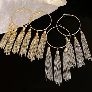 Retro round hoop earrings with long hanging chain tassels in gold and silver finish.
