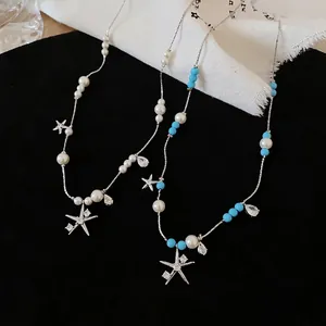 Elegante Halskette mit Seestern, Zirkonia und Perlen für den perfekten Inselurlaub.
