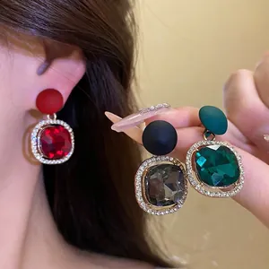 Elegant S925 silver needle earrings with matte finish and encrusted square gemstones