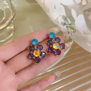 Elegante französische Vintage-Ohrstecker in Blumenform mit lila und gelben Zirkonia