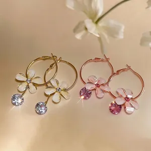 Elegant French style resin flower hoop earrings with sparkling zircon crystals and gold finish