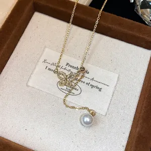 Elegant 18k gold plated necklace featuring a zircon butterfly and pearl pendant