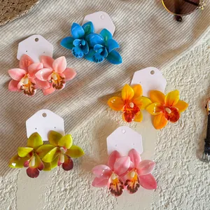 Boucles d'Oreilles Clous en Tissu et Résine Forme de Véritable Orchidée Style Tropical de Vacances pour Femmes Bijoux de Plage Été