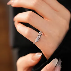 Elegant silver-toned adjustable ring with pave-set zircon bands for a modern look