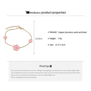 Detailed view of pink flower charm bracelet showing size and material specifications