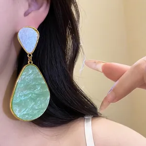Vintage style resin teardrop earrings with green marble effect and S925 silver needle studs