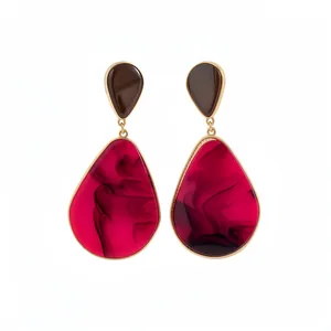 Elegant vintage-style magenta resin teardrop drop earrings with gold-toned metal accents